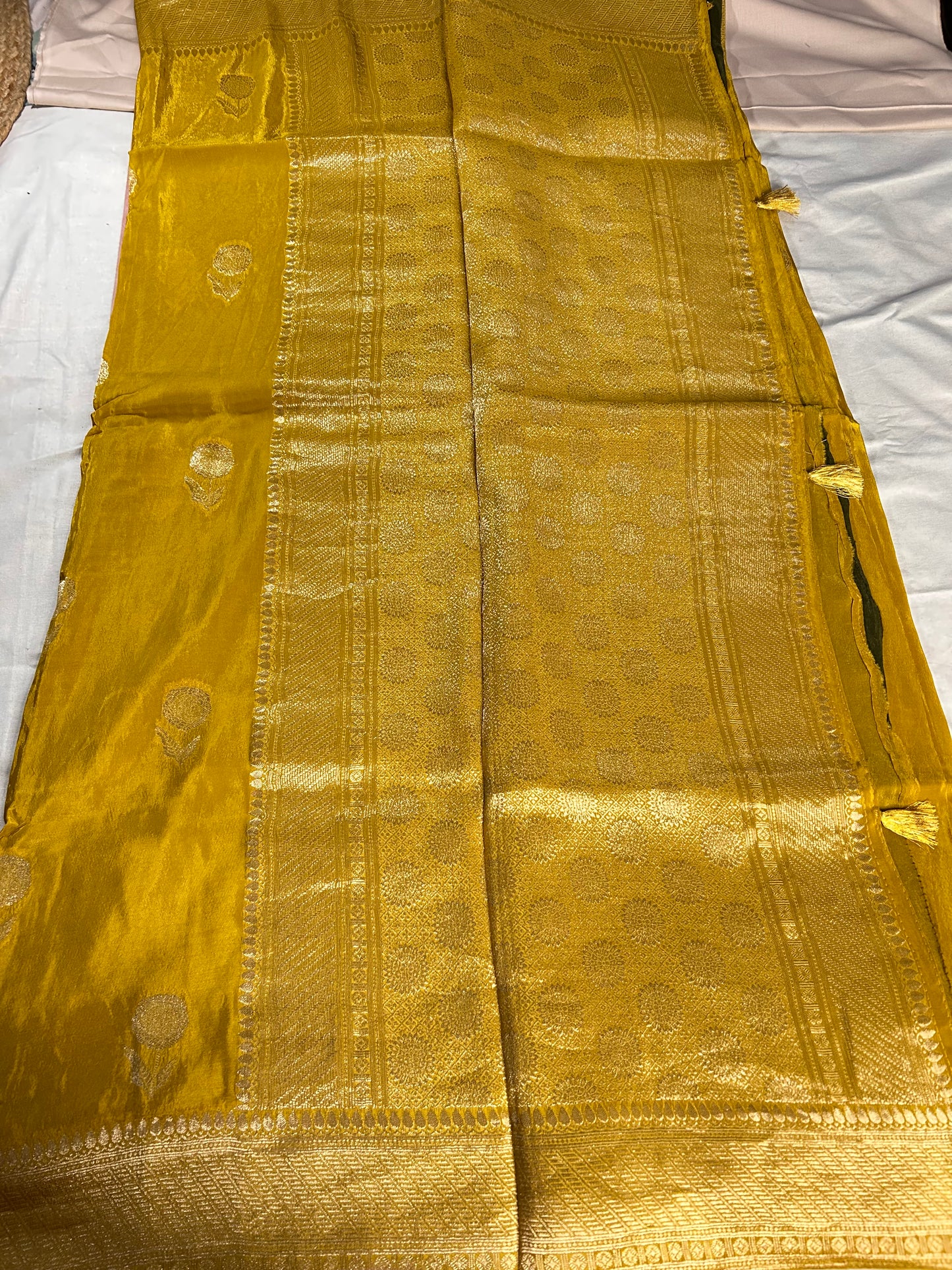 Yellow satin crepe saree