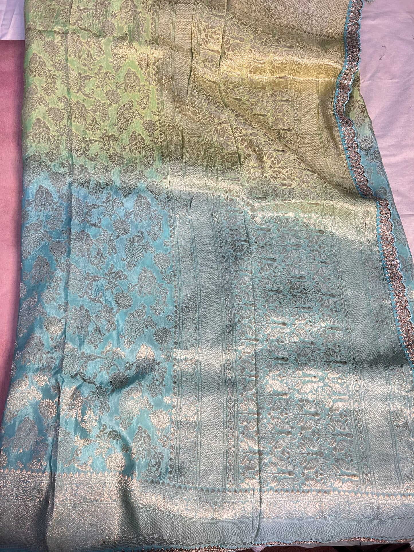 Blue-green brocade crepe saree