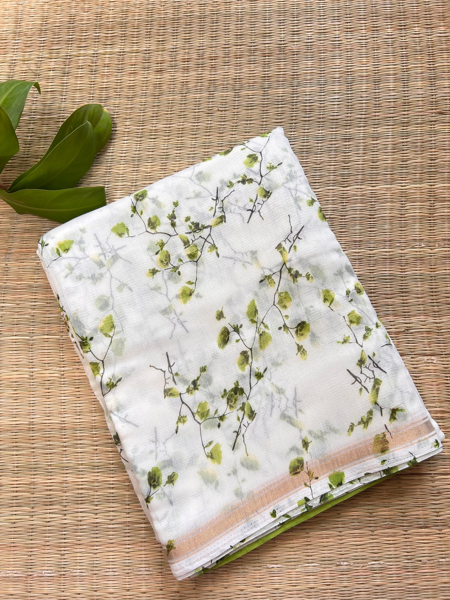 white-green floral cotton silk saree