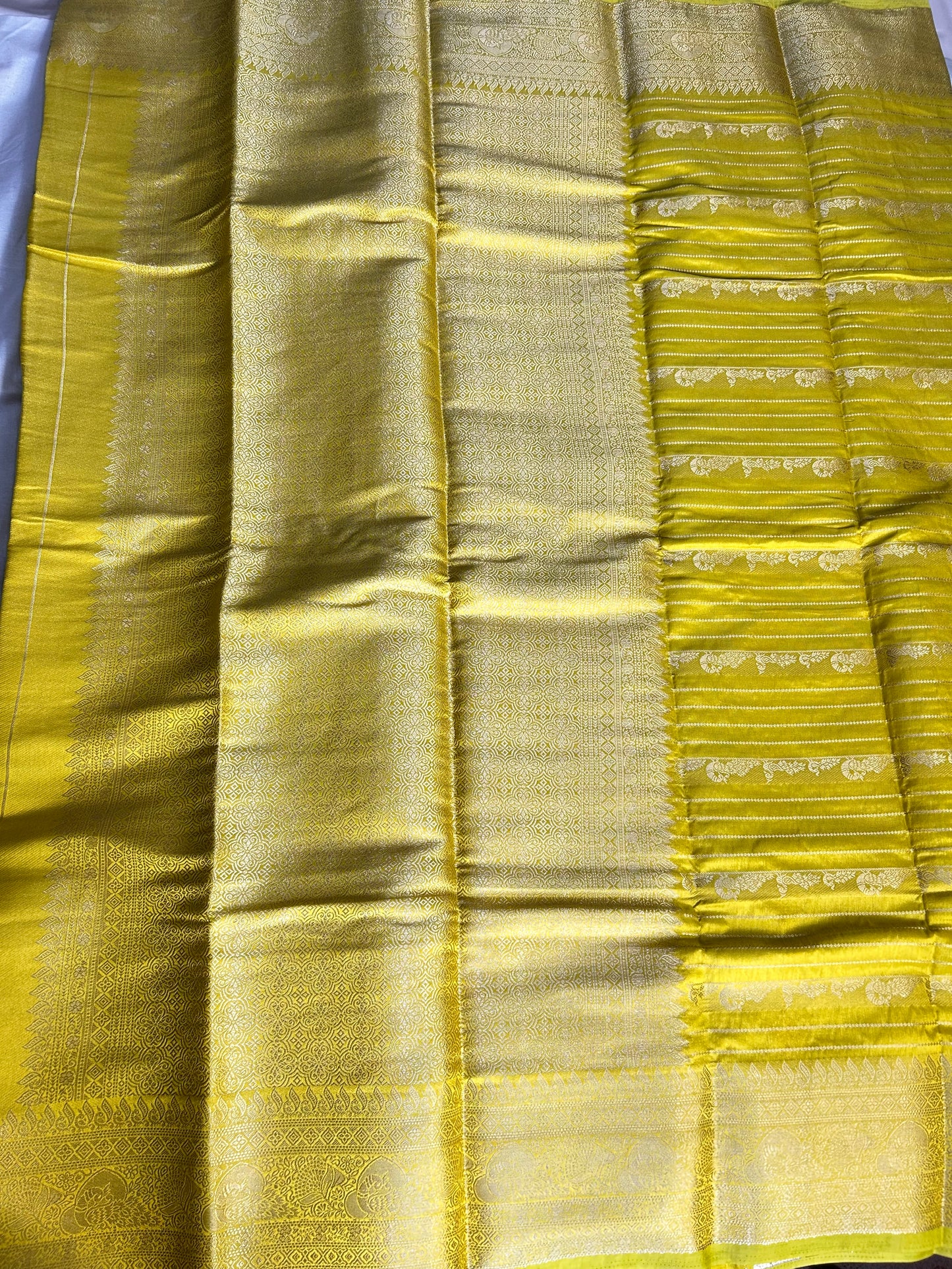 Mustard yellow raw crepe silk saree