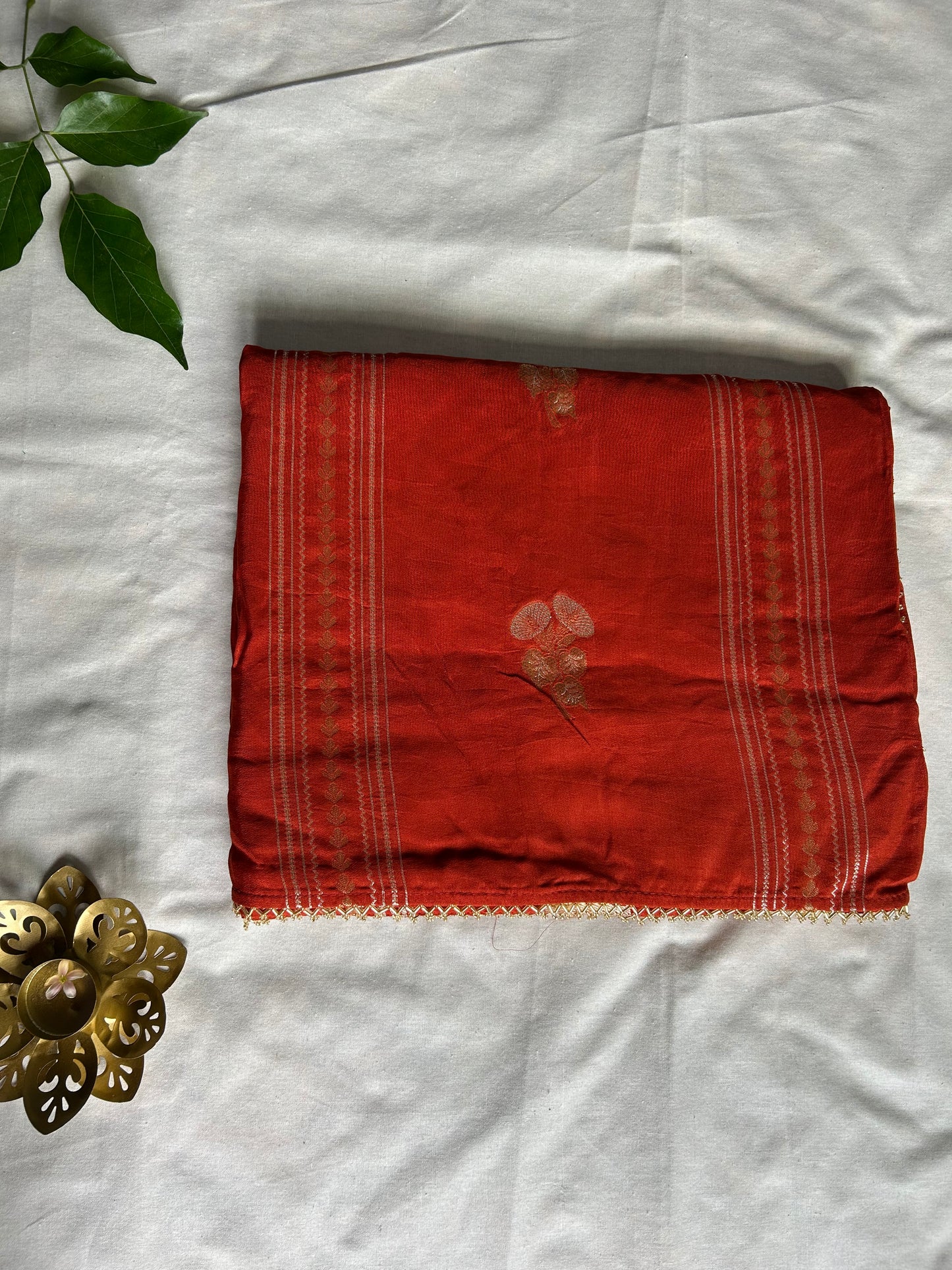 Rust orange chinon crepe saree