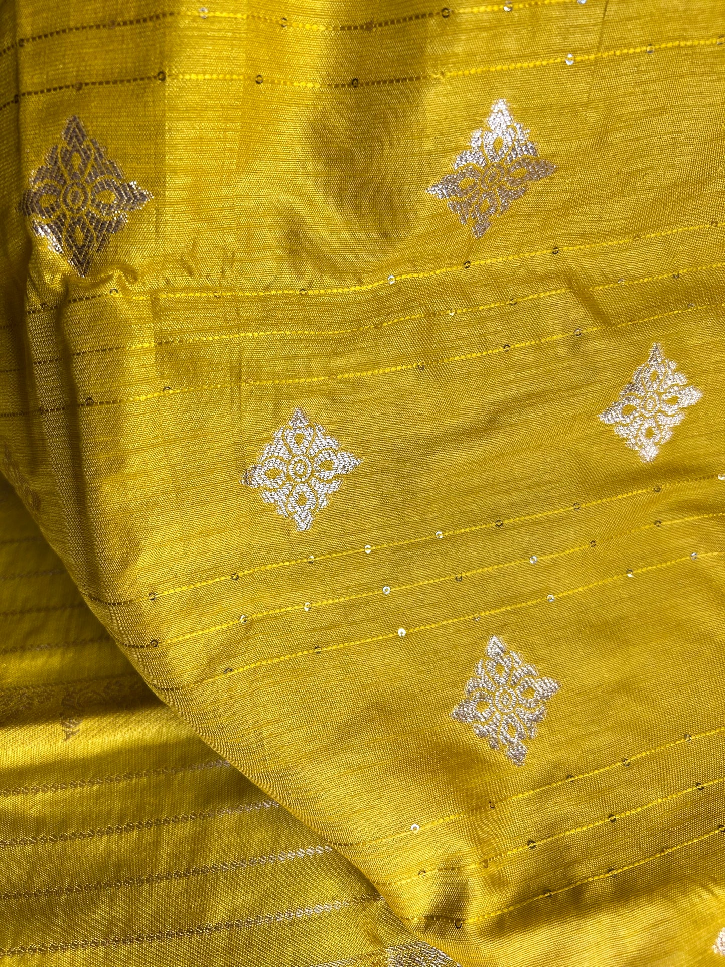 Mustard yellow raw crepe silk saree